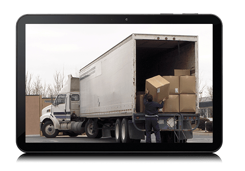 A courier using instant notifications from Bell's asset tracking solution to prevent packages from being forgotten during the delivery process.