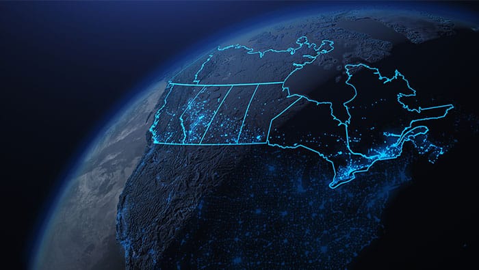 A digital map of Canada at night, showing glowing blue lines that represent network connectivity across the country.