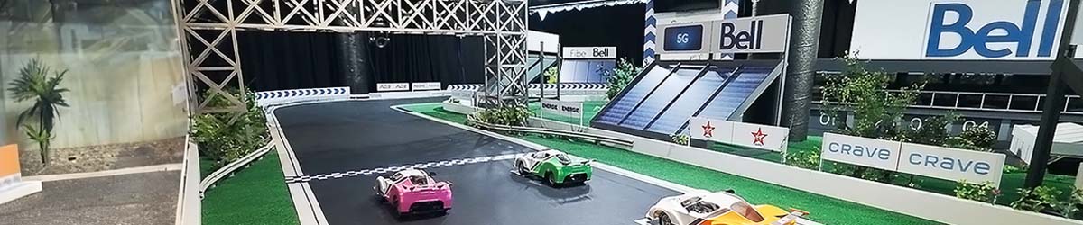 Des voitures de course miniatures sur une piste pour imiter le Formula 1 Grand Prix du Canada.