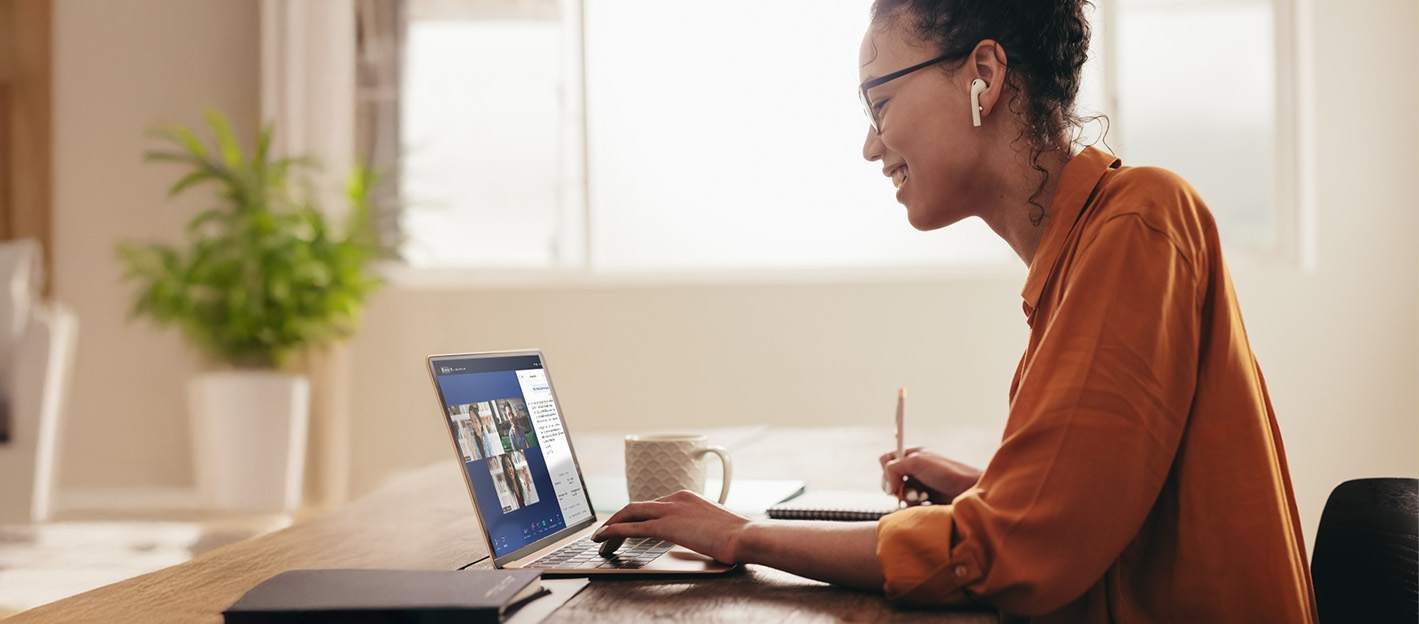 Employee using a seamless, secure and unified platform for voice and video collaboration to connect with colleagues remotely and meet organizational goals.